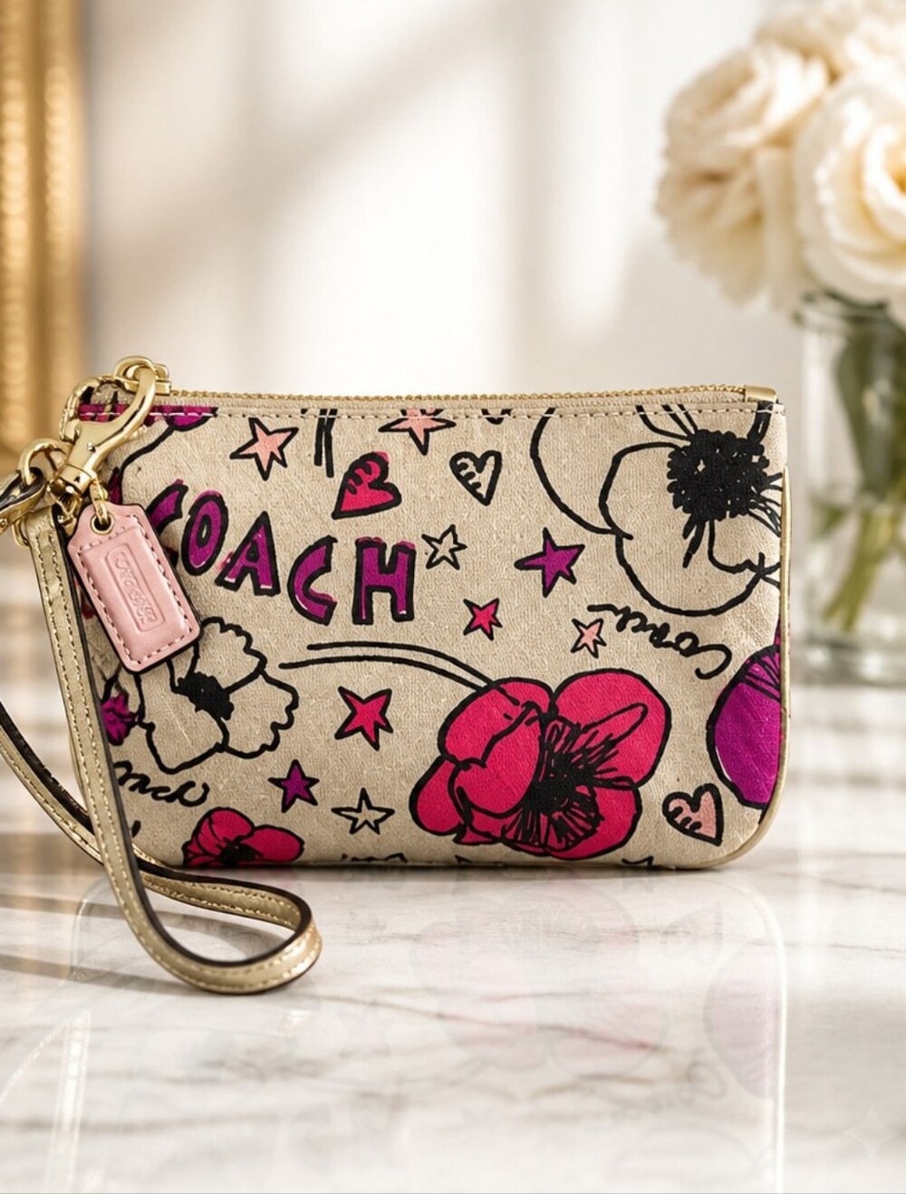 Coach Poppy Floral Canvas Wristlet in Beige and Pink